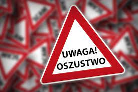 Na ikonografii widoczny znak ostrzegawczy wewnątrz, którego znajduje się napis UWAGA! OSZUSTWO