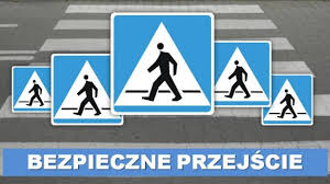 Na zdjęciu widoczny znak przejścia dla pieszych na tle drogi publicznej z przejściem dla pieszych.