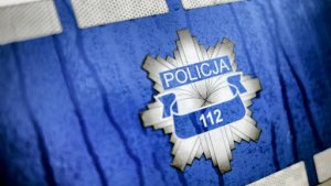 Na zdjęciu widoczny numer alarmowy 112 na tle loga Policji.